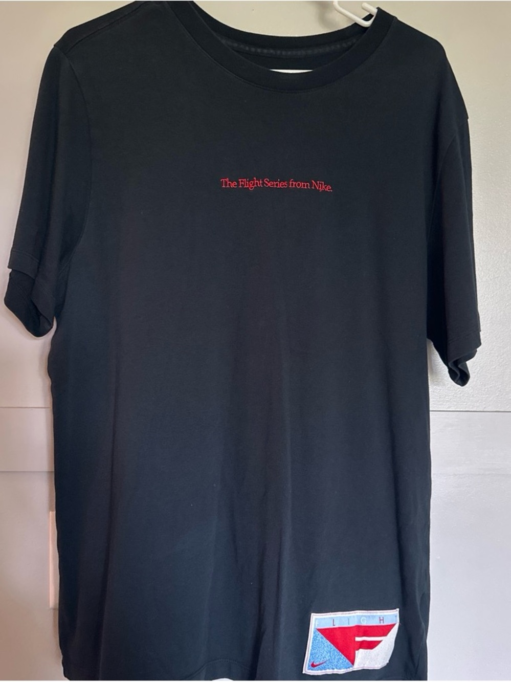 Nike Black Short-Sleeve 'Flight Series' Tee with Red Accent